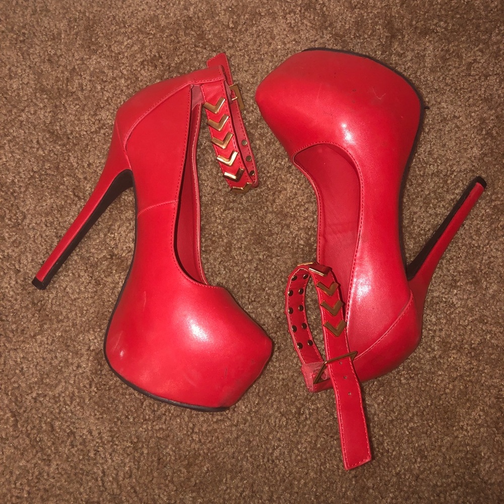 Red heels with gold accent on ankle strap